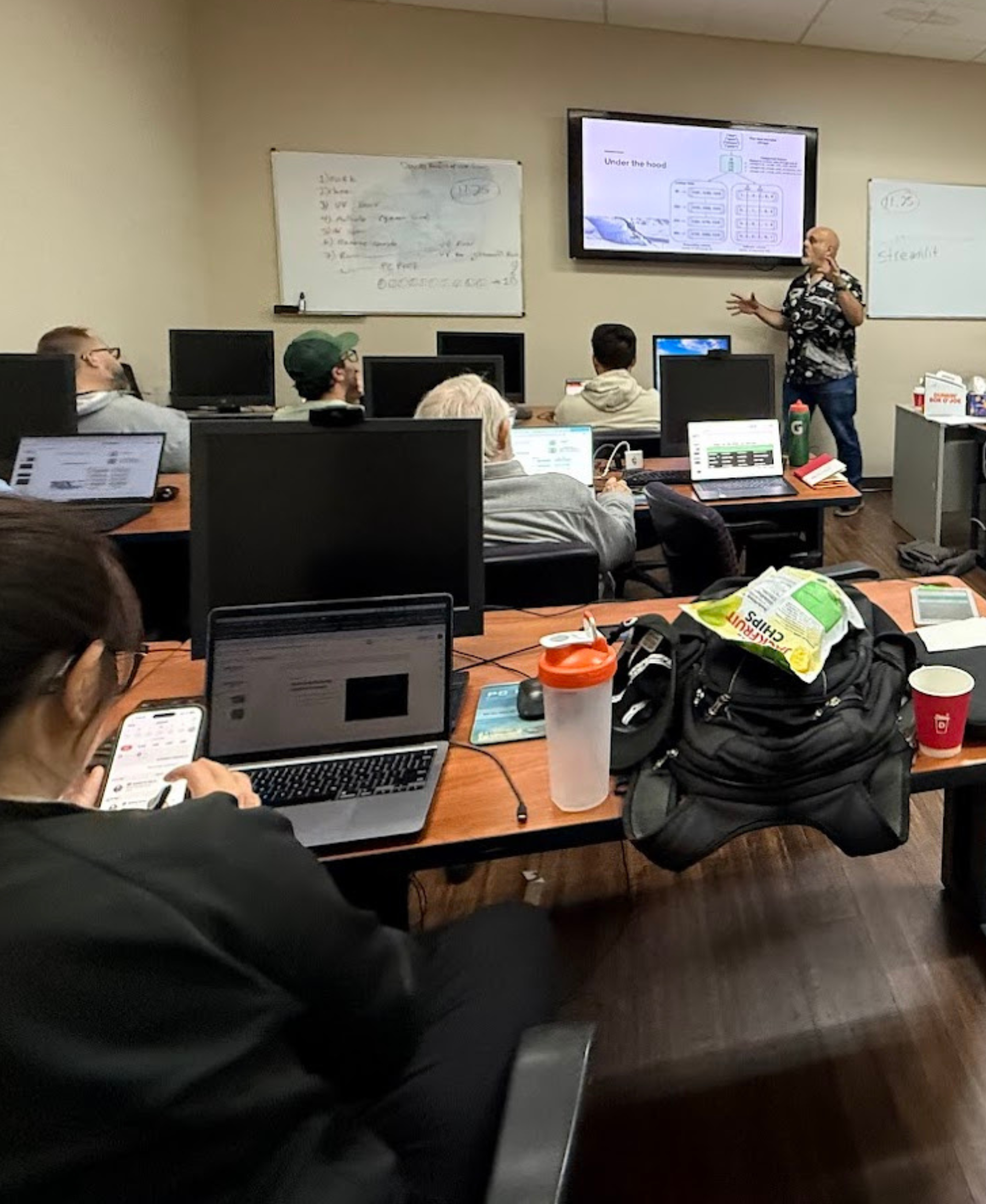 Developers attending the live Dev AI Bootcamp classroom session